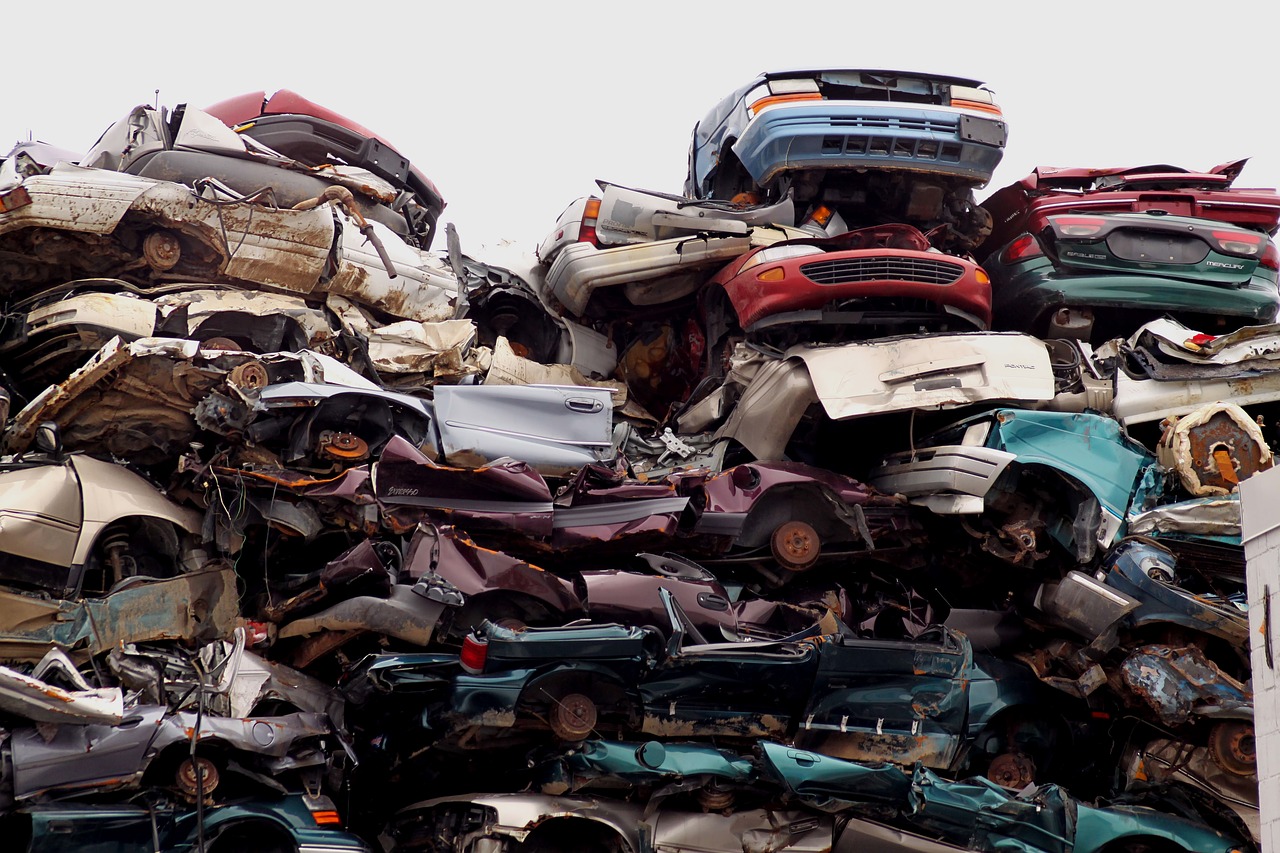 Junk Cars At Wrecker Service Waiting To Be Scrapped