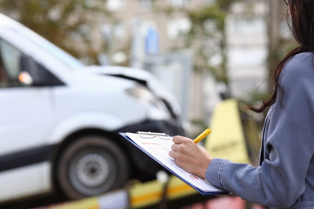 filling our a form for car towing
